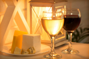 Shelf with a glass of wine and a plate of cheese