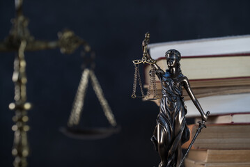 Law and Justice symbols over black background