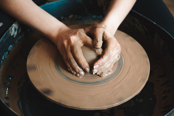 Craftsman works with clay crockery. Small business concept.