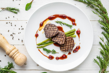 grilled meat steaks. delicious grilled steaks on a plate