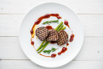 grilled meat steaks. delicious grilled steaks on a plate