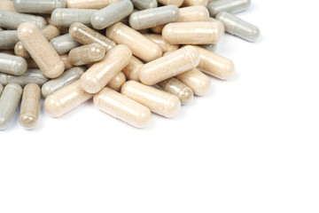 Pills Or Medications Are Scattered On A White Background. Layout for Advertising, Web background. The Concept Of Medicine, Pharmacy And Health Care.