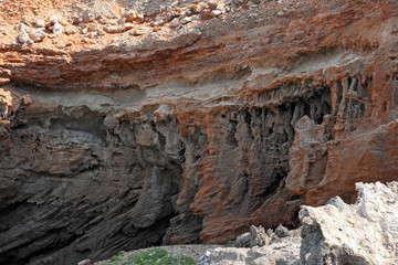 Caves and rock formations of the rocky coast of the island of Marettimo, in the Egadi Islands in Sicily, Italy.