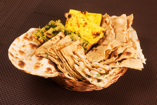 Indian Bread Basket which includes chapatis, roti and parathas
