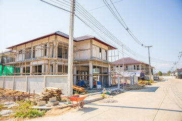 Fototapeta na wymiar New residential house contemporary style building in progress at construction site