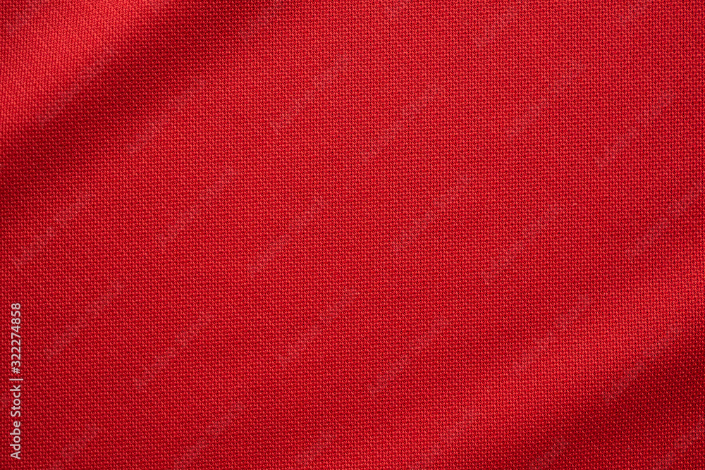 Wall mural Red sports clothing fabric football jersey texture close up