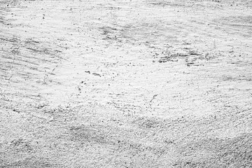 Texture of a concrete wall with cracks and scratches which can be used as a background