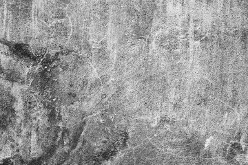 Texture of a concrete wall with cracks and scratches which can be used as a background
