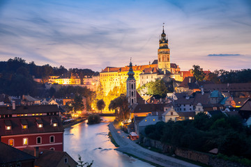 Fototapeta na wymiar Beautiful view of castle and river Vltava in Cesky Krumlov after sunset, Czech republic