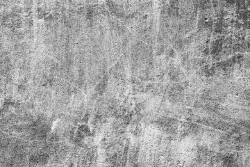 Texture of a concrete wall with cracks and scratches which can be used as a background
