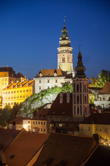 Fototapeta na wymiar Beautiful portrait view to church and castle in Cesky Krumlov at night, Czech republic