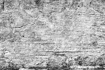 Texture of a concrete wall with cracks and scratches which can be used as a background
