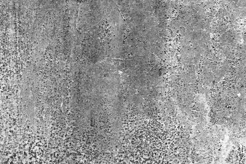 Texture of a metal wall with cracks and scratches which can be used as a background