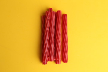 sweet red gummy licorice in color background