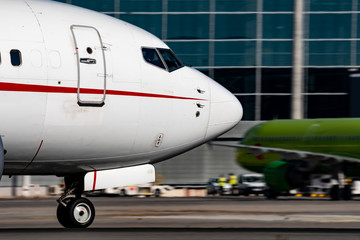 Jet plane cockpit landing with blurred background