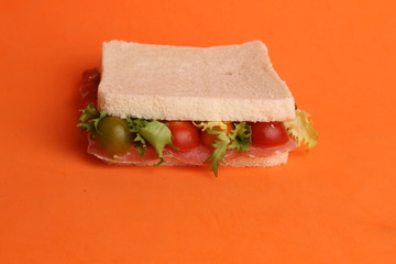 Spanish serrano ham sandwich with tomato and lettuce