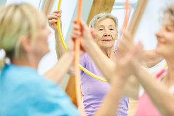 Senior cared for by a physiotherapist