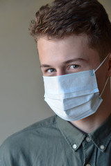 young man in protective mask