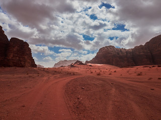 Beautiful Scenery Scenic Panoramic View Red Sand Desert and Ancient Sandstone Mountains Landscape in Wadi Rum, Jordan