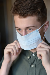young man in protective mask