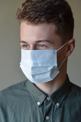 young man in protective mask