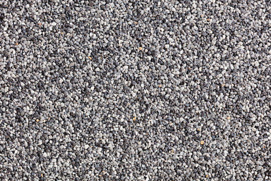 Close up of a natural stone carpet. Decorative stone coating. Slip resistant floor finish containing natural stone particles