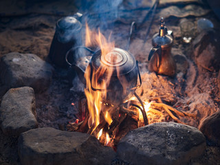 Traditional bedouin tea on fire in the Wadi Rum desert, Jordan