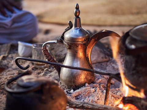 Traditional Bedouin coffee with spices on fire