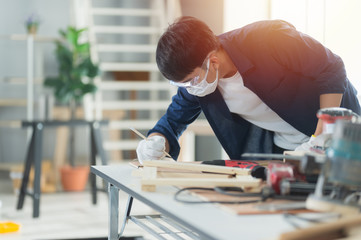 the carpenter working in the working space