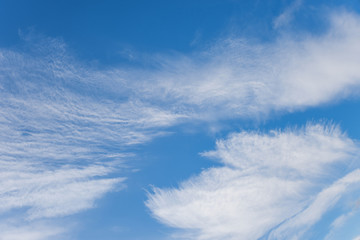 fringed clouds at blue sky on a stormy day