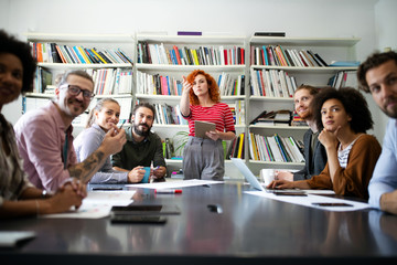 Group of young business people and designers.They working on new project.Startup concept.