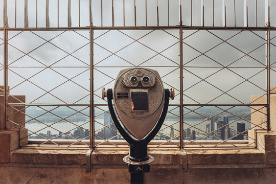 Vintage binoculars viewer,  Empire State Building, New York City, USA
