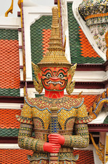 Fototapeta premium Giant or Yaks-ha at Wat Ph-ra Kaew in Bangkok, Thailand. .Wat Phra Kaew or The Emerald Buddha temple have many of the statues and figurines there are characters from the Ramakien