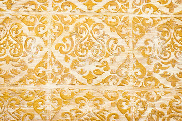 background of royal gold wooden vintage background with floral emboss details