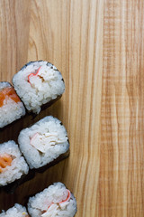 Fresh and delicious rolls, sushi and Japanese cuisine. rolls with salmon, avocado, cucumber, flying fish ROE and cream cheese inside. Sushi menu. Flatley food. the view from the top.