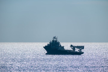 Offshore ship crane in the sea