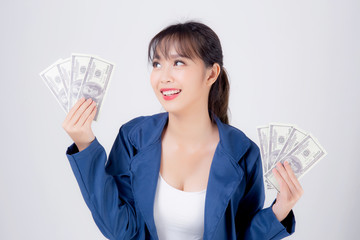 Beautiful portrait young business asian woman holding money isolated on white background, businesswoman showing banknotes with excited, happy girl income with profit finance and success concept.