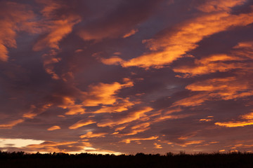 Colorful twilight red and black dramatic sunset sky