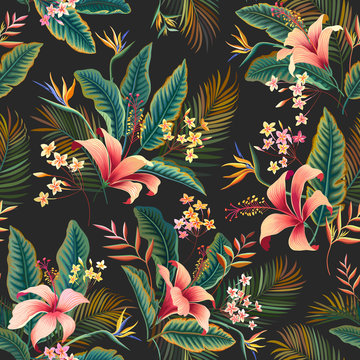 seamless floral pattern. tropical floral tropical pattern with hibiscus and palm tree leaves on dark background