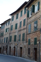 Fototapeta na wymiar Beautiful medieval street in Siena Tuscany Italy Europe