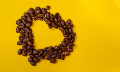 roasted coffee beans in the form of a hart