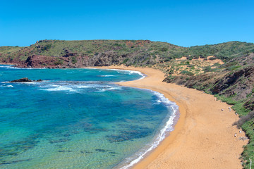 Obraz premium View of Cala Cavalleria beach in Menorca, Balearic islands, Spain