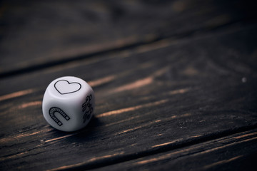 Cubes dice with funny life style symbols. heart sign on a top side