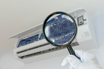 Picture from a magnifying glass Dust and dirt on air filters In air conditioners