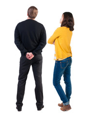 Back view of couple in sweater.