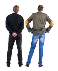Back view of two man in sweater.