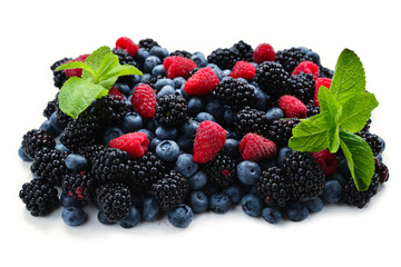 Blackberry, raspberry, blueberry and mint background.