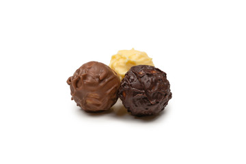 Chocolate truffle isolated on white background.