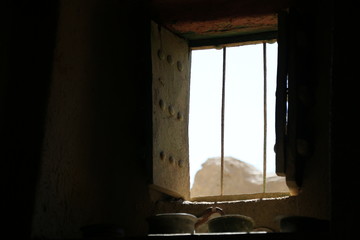 Window in one a of the old houses of the ancient village of Al Hamra