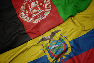 waving colorful flag of ecuador and national flag of afghanistan.